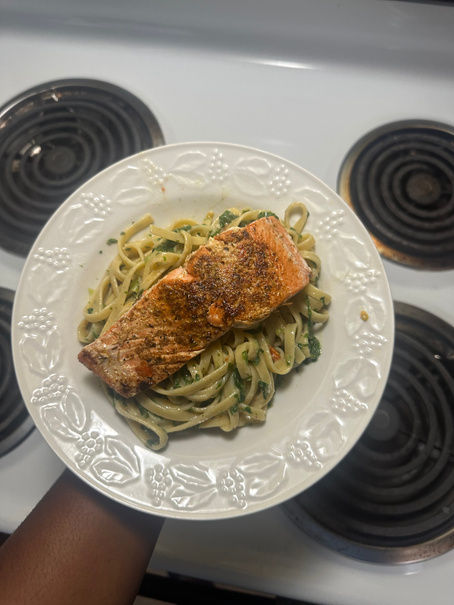 Salmon over pasta
