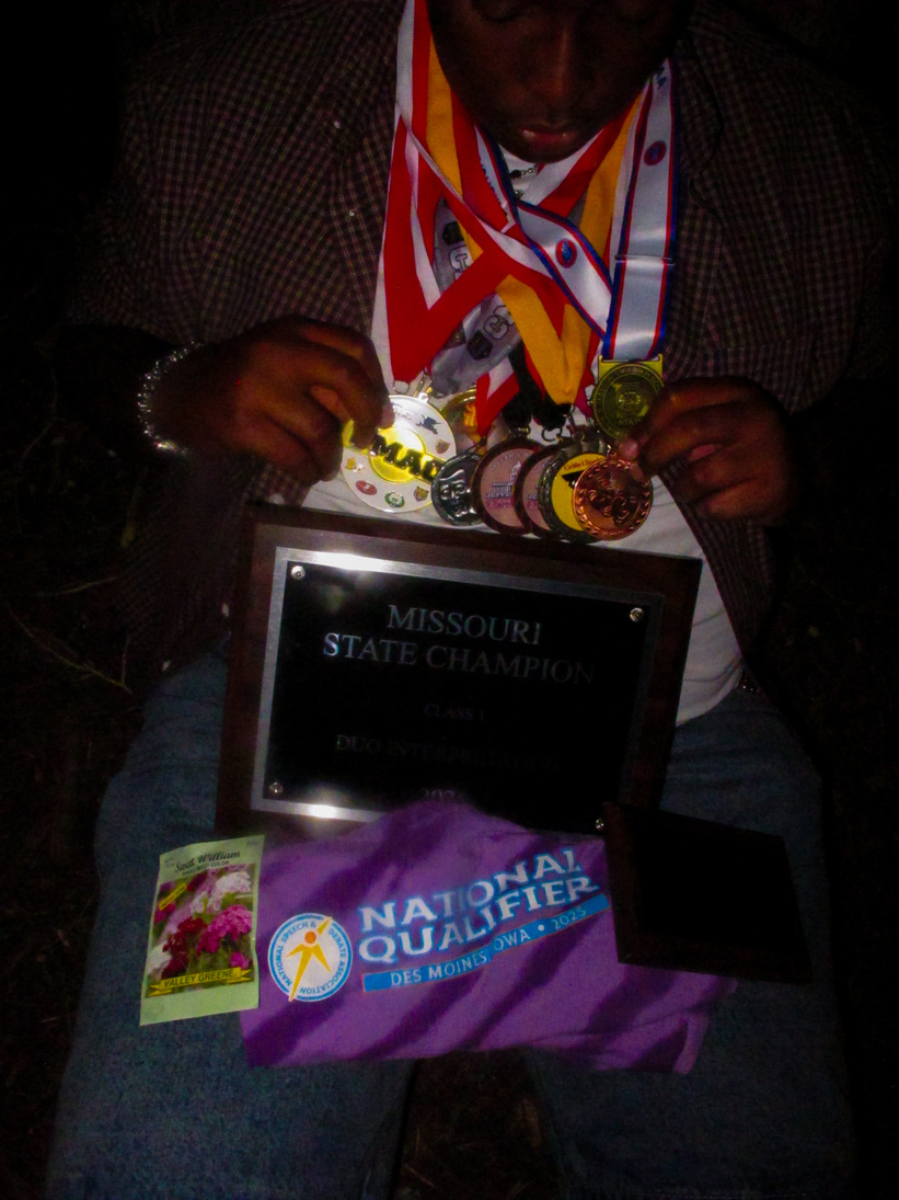 State champion medals and plaque