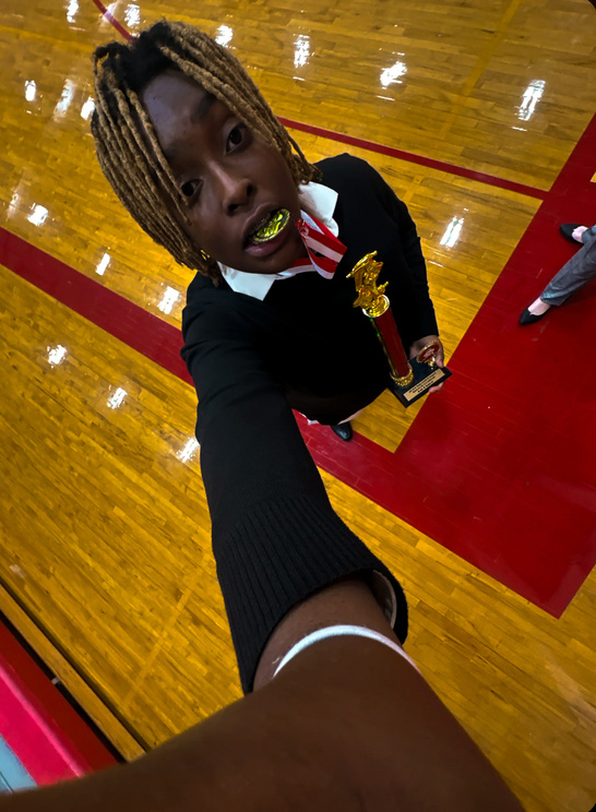 Selfie holding a trophy