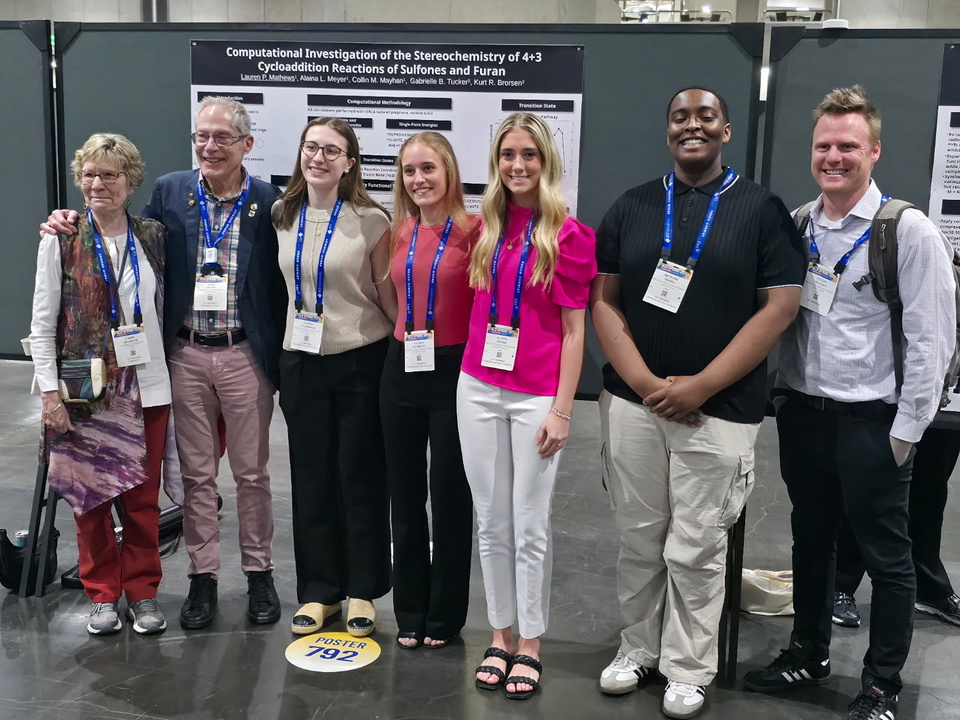 Research team at their poster presentation